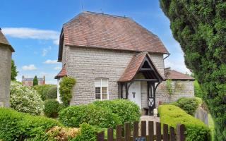 The grade II-listed cottage in Upton Cemetery.